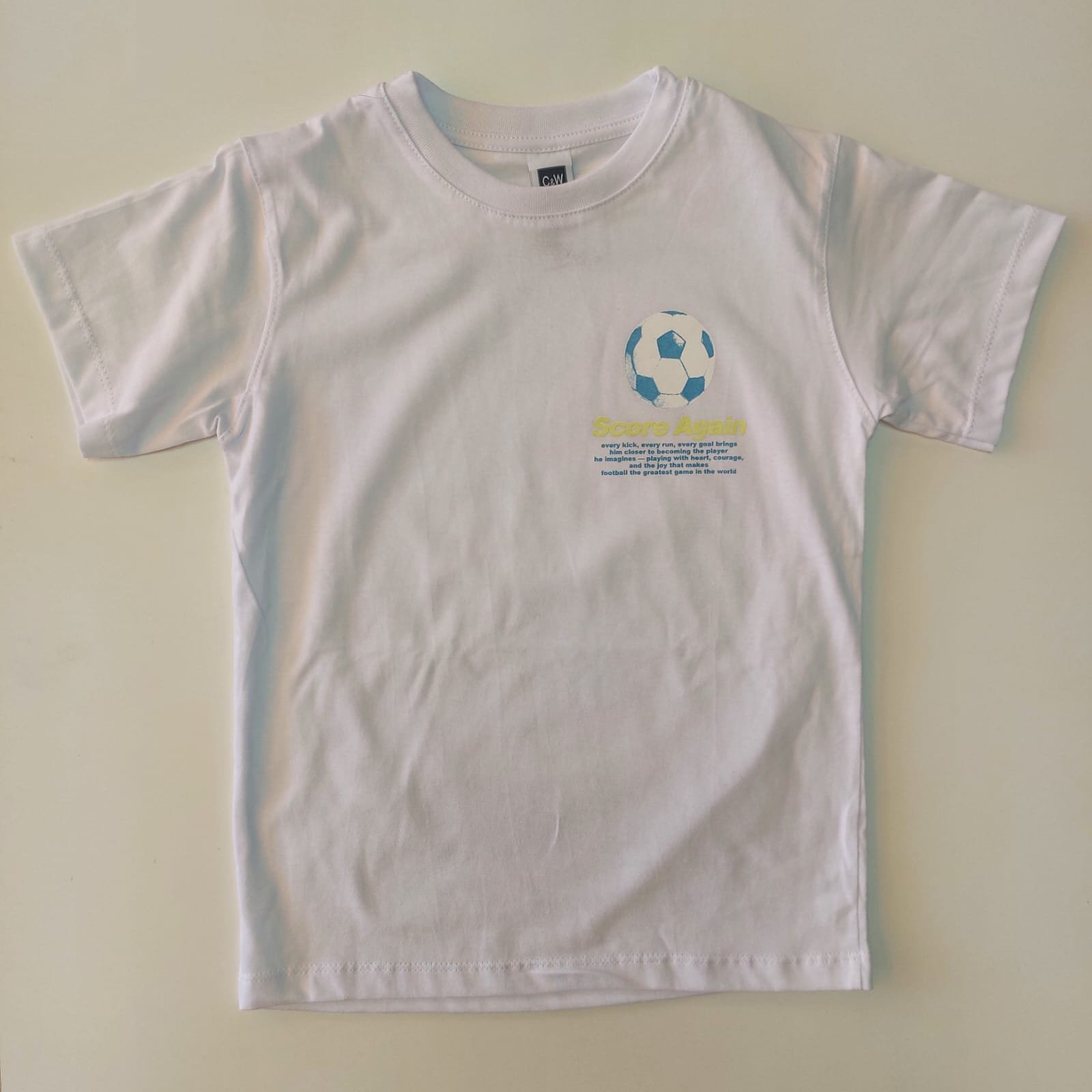 Remera Infantil Blanca “Score Again” Fútbol